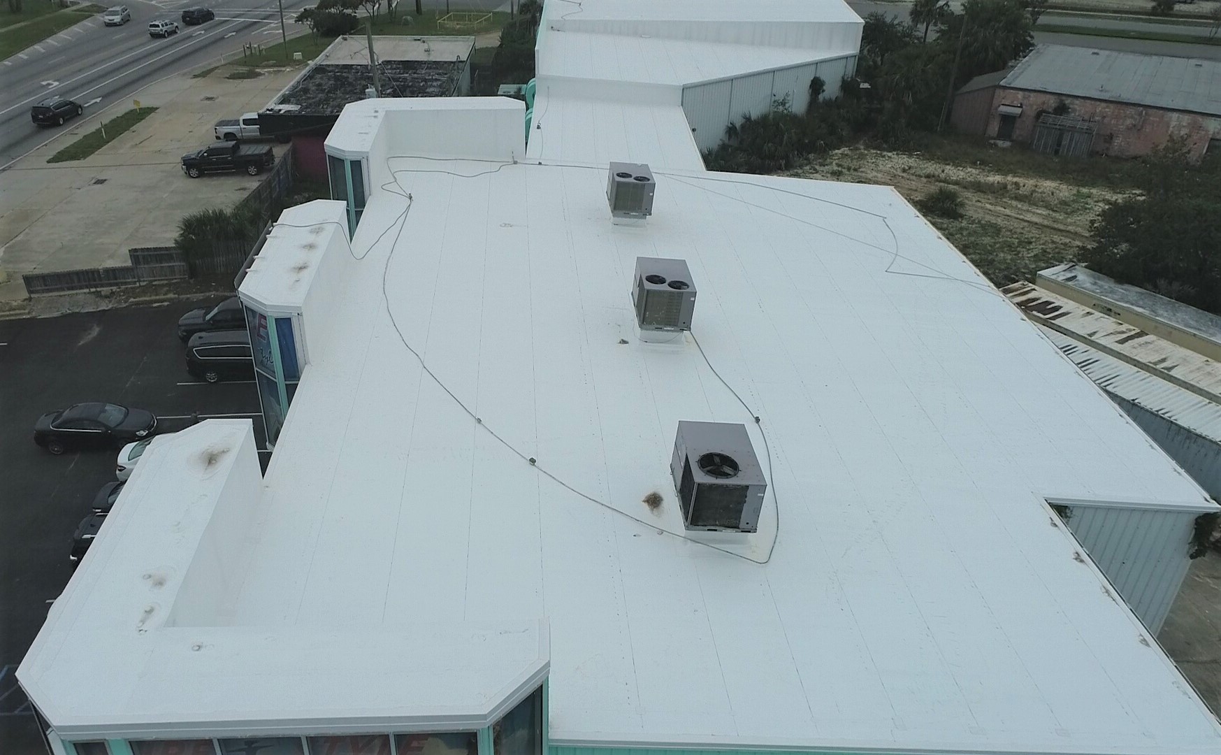 Fort Walton Beach, Florida Roofing Company for Commercial Businesses. New Roof on Surf Style